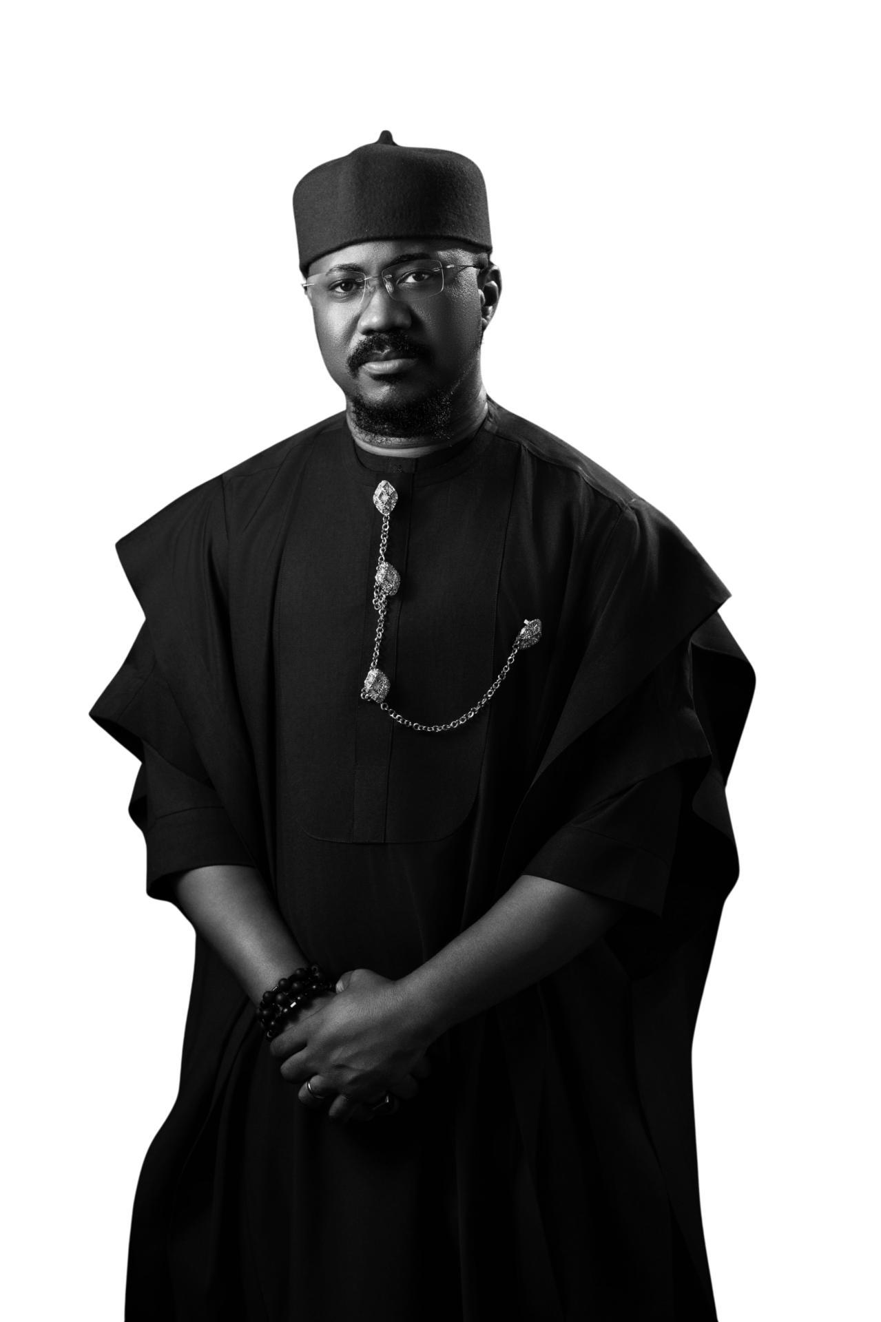Joshua Rey portrait in traditional black agbada